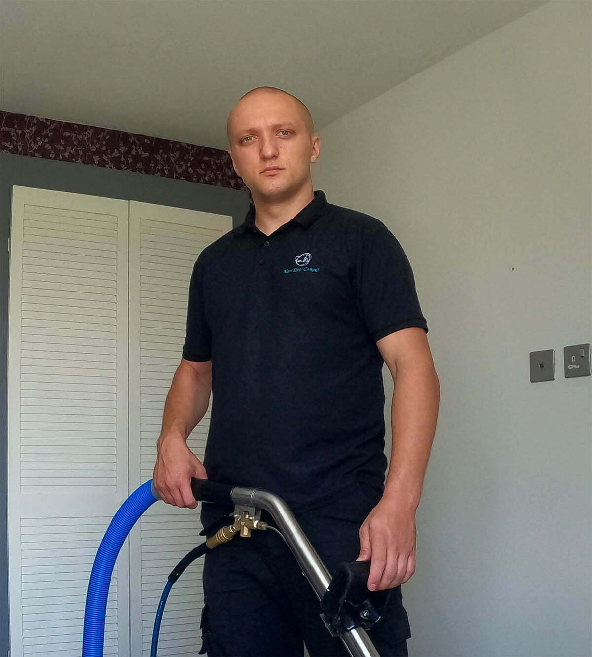 Jack, owner of New Life Carpet, with carpet cleaning equipment