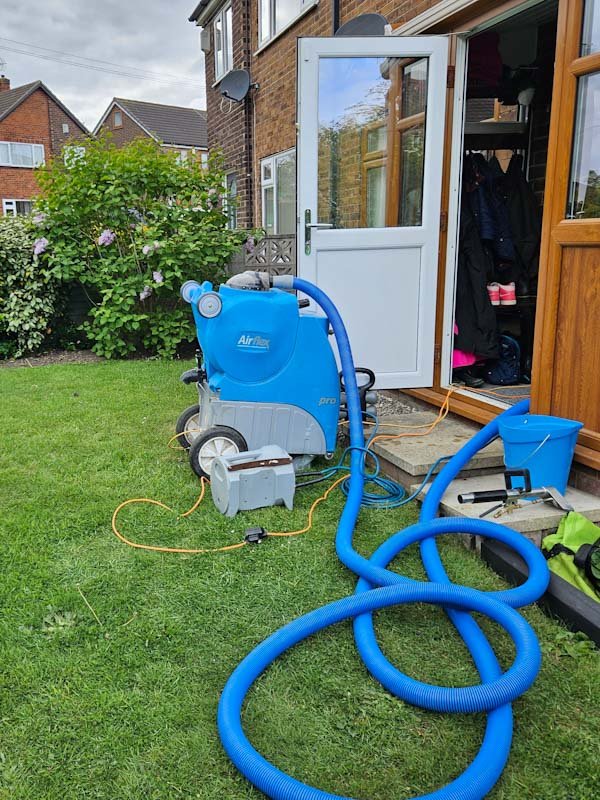 Carpet Cleaning Doncaster | 5-Star Rated Local Service 3 Professional carpet cleaning equipment set up outside a home in Doncaster