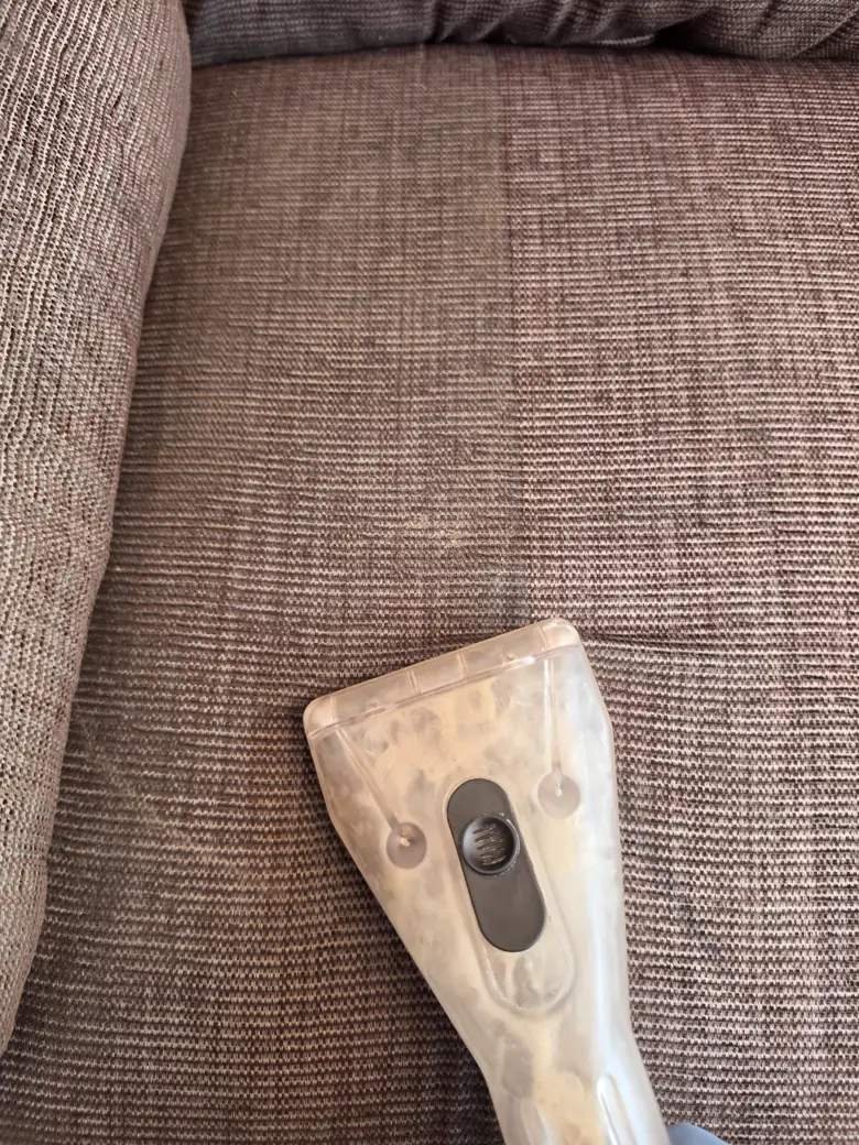 New Life Carpet cleaning brown fabric upholstery with professional equipment