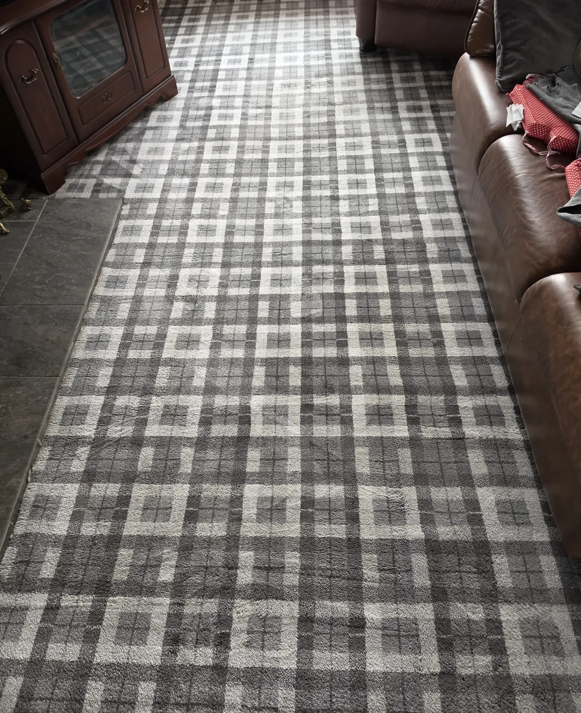 Carpet & Upholstery Cleaning Knottingley & Ferrybridge 3 Grey checked carpet beside seating and a fireplace hearth