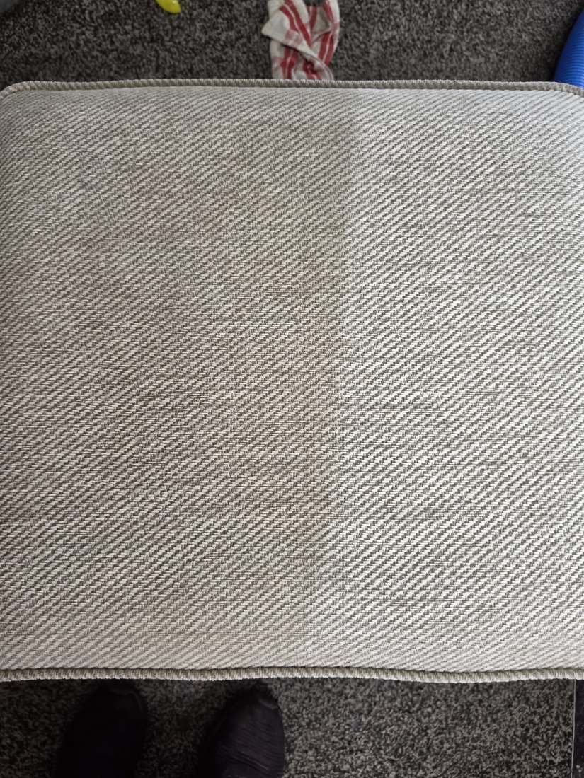Upholstery Cleaning Leeds | Sofa & Chair Cleaning 2 Fabric upholstered seat showing an in-progress cleaned section during New Life Carpet work