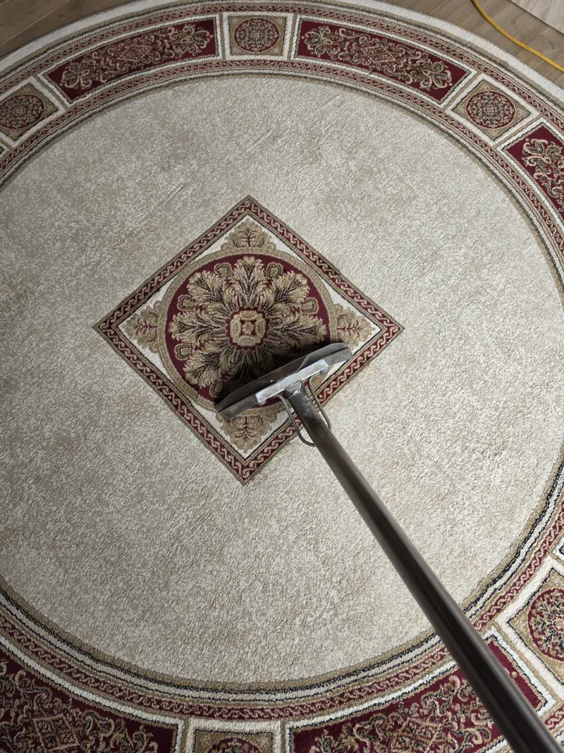 Carpet Cleaning in Pontefract 5 Professional extraction wand cleaning a patterned cream and red rug
